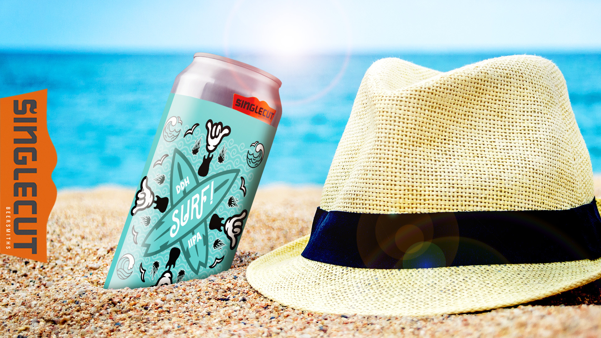 a can of beer called "surf" half buried in a the sand on a beach with a blue sky and a hat.